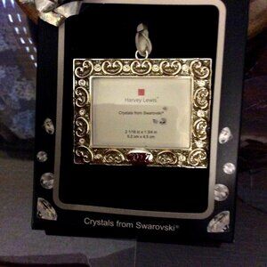 Harvey Lewis 2017 Holiday picture frame ornament.